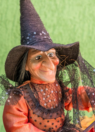 Old witch figurine statue for Halloween decoration.の写真素材