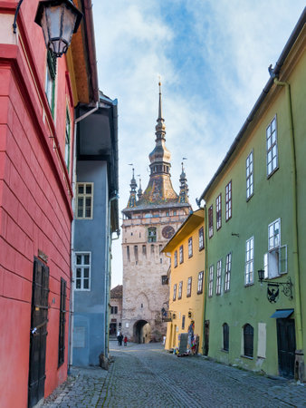 Sighisoara Romania - 11.26.2020: The iconic Clock Tower (Turnul cu ceas) Built in the 14th century. Historical landmark in the medieval town of Sighisoara.のeditorial素材