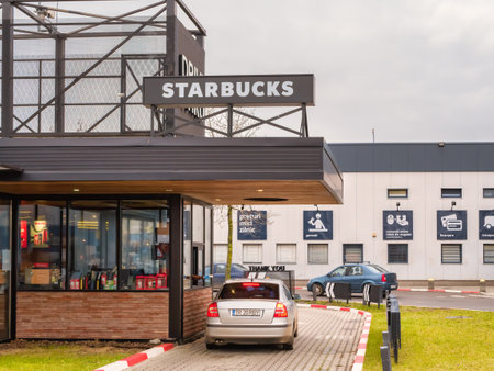 Bucharest Romania - 12.21.2020: Starbucks coffeehouse chain Drive Thru at Militari Shopping Center, Bucharestのeditorial素材