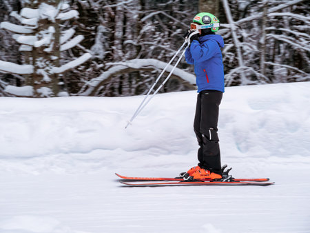 Predeal, Romania - 01.13.2021 - Skier enjoying skiing on the Clabucet ski lope in Predeal Mountain resort in Romaniaのeditorial素材