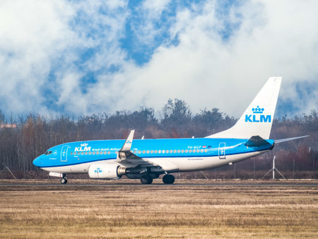 Otopeni, Romania - 01.23.2021: A KLM Royal Dutch Airlines Boeing 737-7K2 (PH-BGP) airplane on the airport runway at Henri Coanda International Airport.のeditorial素材