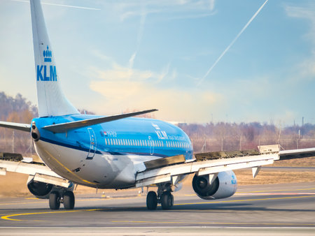 Otopeni, Romania - 01.23.2021: A KLM Royal Dutch Airlines Boeing 737-7K2 (PH-BGP) airplane on the airport runway at Henri Coanda International Airport.のeditorial素材