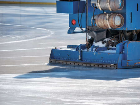 Ice resurfacer smoothing and polishing the surface of the ice rinkの写真素材