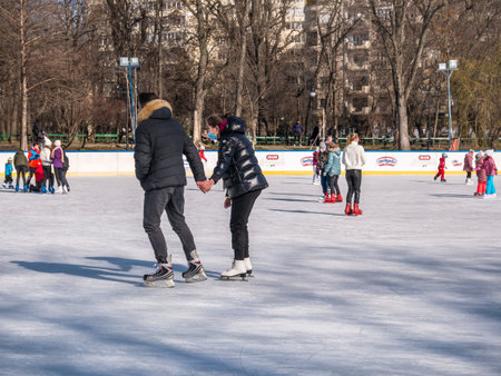 Bucharest, Romania - 02.12.2021: People enjoying ice skating on the Cismigiu ice rink, in Bucharest.のeditorial素材