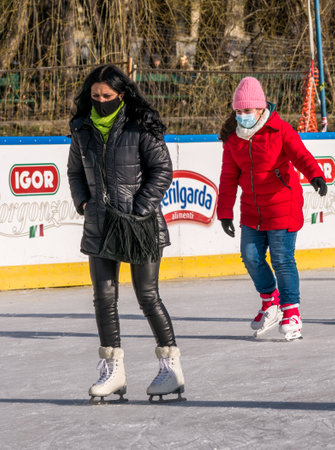 Bucharest, Romania - 02.12.2021: People enjoying ice skating on the Cismigiu ice rink, in Bucharest.のeditorial素材