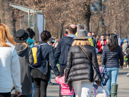 Crowd of people walking on the sidewalk in Bucharest, Romaniaのeditorial素材