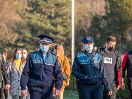 Bucharest, Romania - 03.25.2021: Romanian police officers on patrol in Herestrau park (KIng Mihai I), Bucharestのeditorial素材