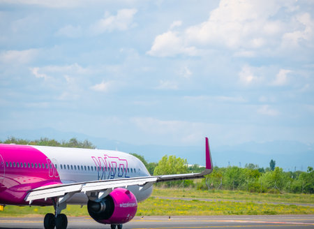 Otopeni, Romania - 05.15.2021: A Wizz Air Airbus A320-232 (HA-LWS) airplane on the airport runway at Henri Coanda International Airport.のeditorial素材