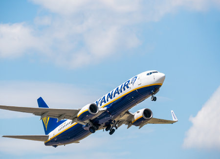 Otopeni, Romania - 05.14.2021: Otopeni, Romania - 05.08.2021: Ryanair Boeing 737-8AS (EI-EGD) flying against blue sky. Airplane takes off from Henry Coanda International Airport.のeditorial素材