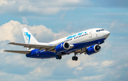 Otopeni, Romania - 05.14.2021: Blue Air Boeing 737-5L9 (YR-BAG) airplane takes off from Henri Coanda International Airportのeditorial素材