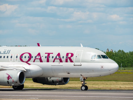 Otopeni, Romania - 05.08.2021: Qatar Airways Airbus A320-232 (A7-AHT) on the airport runway at Henri Coanda International Airport.のeditorial素材