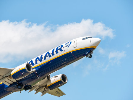Otopeni, Romania - 05.14.2021: Otopeni, Romania - 05.08.2021: Ryanair Boeing 737-8AS (EI-EGD) flying against blue sky. Airplane takes off from Henry Coanda International Airport.のeditorial素材