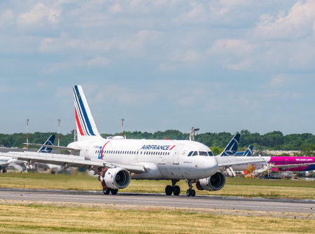 Otopeni, Romania - 05.15.2021: An Air France Airbus A319-111 (F-GRXL) airplane on the airport runway at Henri Coanda International Airportのeditorial素材