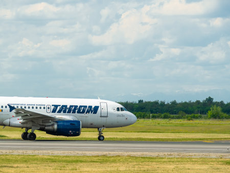 Otopeni, Romania - 05.15.2021: A Tarom Boeing 737-78J (YR-BGF) airplane on the airport runway at Henri Coanda International Airport.のeditorial素材
