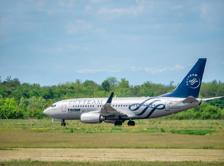 Otopeni, Romania - 05.14.2021: SkyTeam Livery on A Tarom Boeing 737-78J (IR-BGF) arriving from Amsterdam to Henry Coanda International Airportのeditorial素材