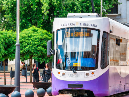 Timisoara, Romania - 06.25.2020: Number 2 city tram on tracks in Timisoara. Public transport society (STPT)のeditorial素材