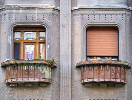 Old elegant architectural detail of a balcony in the center of Timisoara, Romania.の写真素材
