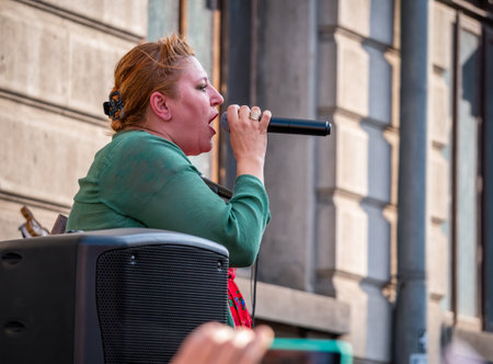 Bucharest, Romania - 07.24.2021: Romanian Senator Diana Iovanovici Sosoaca giving a speech at a protest against COVID-19 restriction measures for those who refuse the vaccineのeditorial素材