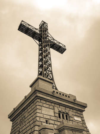 View with the Heroes Cross on Caraiman peak, in Bucegi Mountains Romania.の写真素材