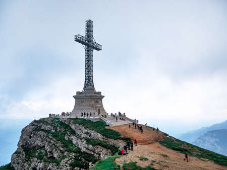 Busteni, Romania - 07.10.2021: View with the Heroes Cross on Caraiman peak, in Bucegi Mountains Romania.の写真素材