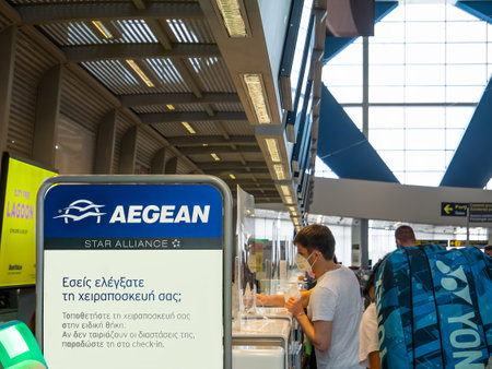 Bucharest, Romania - 08.28.2021: Aegean Airlines check in counters at Henry Coanda (Otopeni) International Airportのeditorial素材