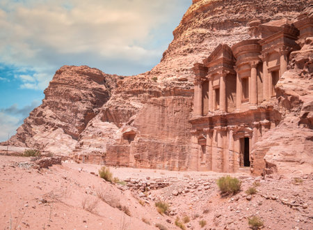 Ad Deir (The Monastery), the monumental building carved in red rock in the ancient city of Petra, Jordanの写真素材