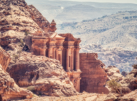 Ad Deir (The Monastery), the monumental building carved in red rock in the ancient city of Petra, Jordanの写真素材