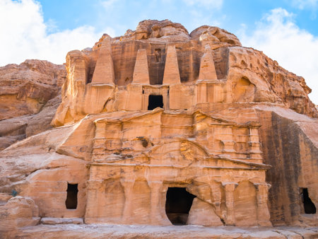 Ancient ruins of the burial complex carved into rocks called Obelisk tomb, in Petra Jordan.の写真素材