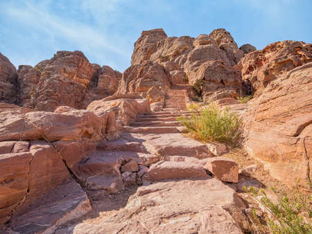 View with the Al-Khubtha Trail stone stairs that leads to the Treasury Viewpoint in the ancient city of Petra, Jordanの写真素材