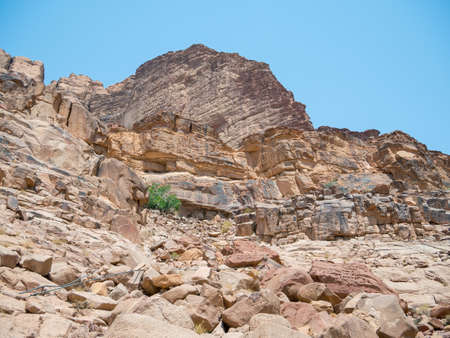 The short hike to the famous Lawrence Spring in Wadi Rum desert, Jordan.の写真素材