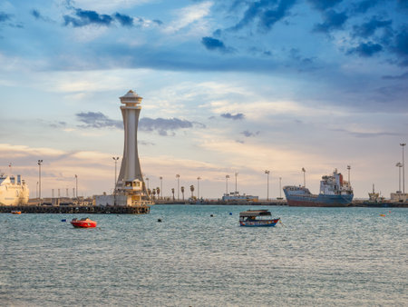 Aqaba, Jordan - 09.01.2021: Scenic view at sunset with Aqaba Port Observation or control Tower, Jordan. Lighthouse at sunsetのeditorial素材