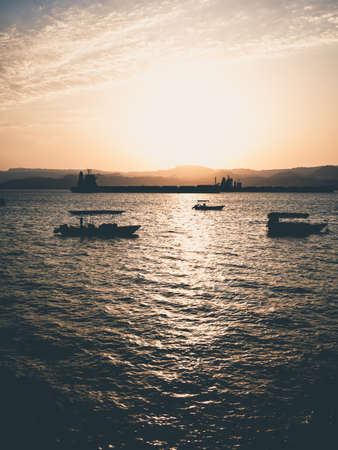 Scenic view at sunset from Aqaba Port , Jordan. Sunset on the Red Seaの写真素材