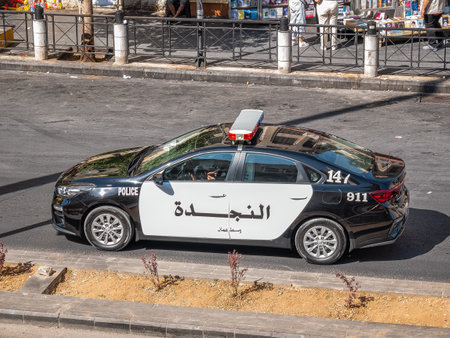 Amman, Jordan - 09.02.2021: Jordanian police car on the streets of Amman.のeditorial素材