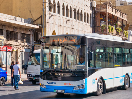 Amman, Jordan - 09.02.2021: Otokar public bus transport on the streets of Amman city, Jordanのeditorial素材