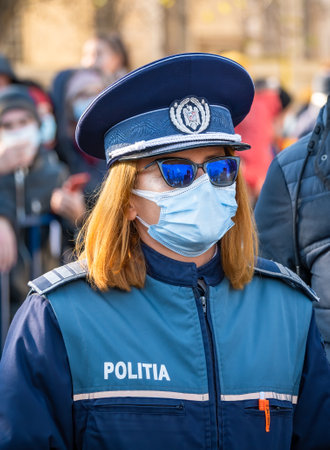 Bucharest, Romania - 12.01.2021: Female police officer at the unity day national military parade in Bucharest.のeditorial素材
