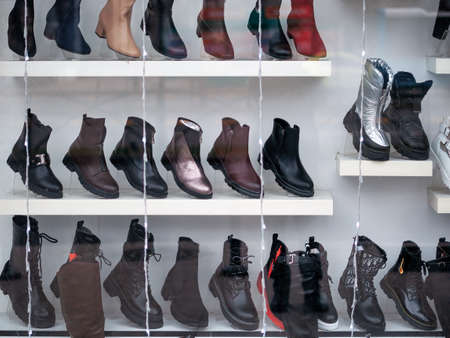 Display of natural leather shoes in the window store.の写真素材