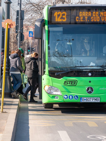 Bucharest, Romania - 02.04.2022: New Mercedes buses belonging to Bucharest Transit Corporation( Societatea de Transport Bucuresti -STB) in traffic.のeditorial素材