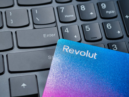 Bucharest, Romania - 03.25.2022: Revolut bank credit or debit card on a computer keyboard. Online electronic commerce conceptのeditorial素材