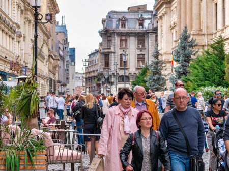 Bucharest, Romania - 04.08.2022: Busy weekend day with many people on the streets of the old town center in Bucharest.のeditorial素材
