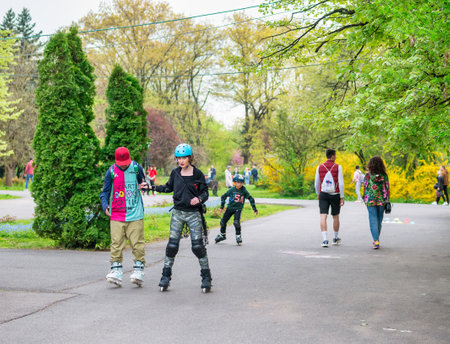 Bucharest, Romania - 04.15.2022: Busy weekend with many tourists and locals out for a stroll in King Mihai I park (Herestrau)のeditorial素材