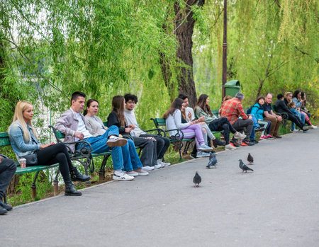 Bucharest, Romania - 04.15.2022: Busy weekend with many tourists and locals out for a stroll in King Mihai I park (Herestrau)のeditorial素材