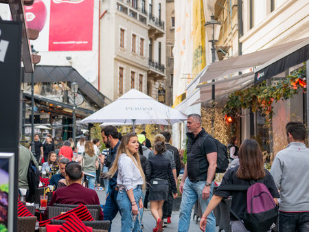 Bucharest, Romania - 04.08.2022: Busy weekend day with many people on the streets of old town center in Bucharest.のeditorial素材