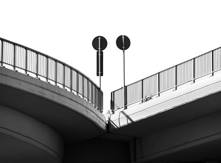 Abstract black and white picture. Traffic signs on a bridgeの写真素材
