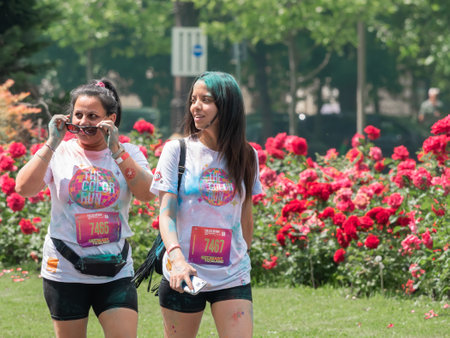 Bucharest, Romania - April 2022: Many people taking part in the Color Run race in Bucharest. Famous paint race sponsored by Kauflandのeditorial素材