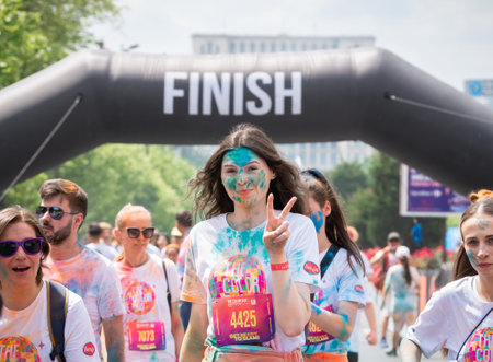 Bucharest, Romania - April 2022: Many people taking part in the Color Run race in Bucharest. Famous paint race sponsored by Kauflandのeditorial素材