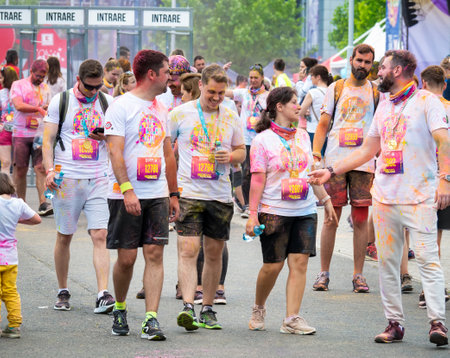 Bucharest, Romania - April 2022: Many people taking part in the Color Run race in Bucharest. Famous paint race sponsored by Kauflandのeditorial素材