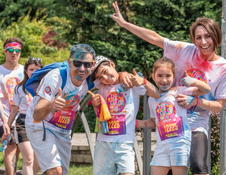 Bucharest, Romania - April 2022: Many people taking part in the Color Run race in Bucharest. Famous paint race sponsored by Kauflandのeditorial素材