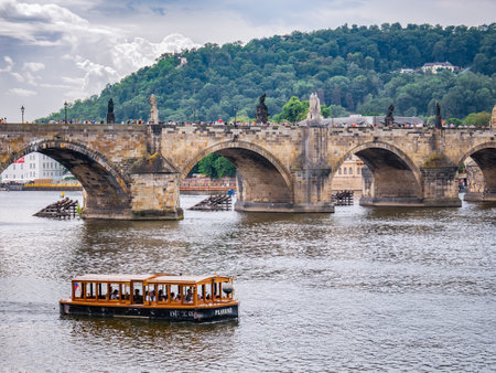 Prague, Czech Republic - June 2022: View with the Charles Bridge main touristic attraction . Medieval stone arch bridge over Vltava river in Pragueのeditorial素材