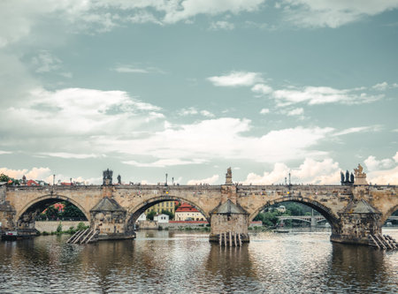 Prague, Czech Republic - June 2022: View with the Charles Bridge main touristic attraction ....