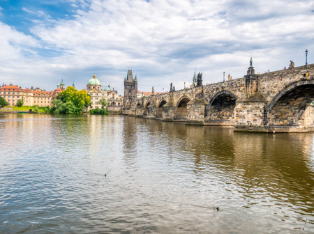 Prague, Czech Republic - June 2022: View with the Charles Bridge main touristic attraction . Medieval stone arch bridge over Vltava river in Pragueのeditorial素材